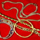 What Is the Difference Between 24 Karat Pure Gold Clad Bronze & Plated Bronze Metal