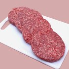 How to Keep Hamburgers From Puffing Up When Cooking