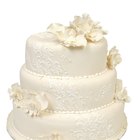 How to Apply a Lace Decoration on a Wedding Cake