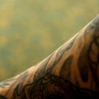 How to Stop Hair Growth Over Tattoos
