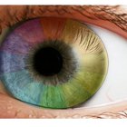 Can albinos wear contact lenses or change their eye color?
