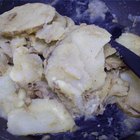 Cómo hacer papas y cebollas fritas en una sartén