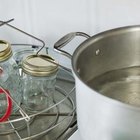 ¿Qué elimina el residuo negro de las ollas de acero inoxidable?