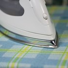 Man ironing laundry