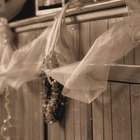 Two young women looking at wedding dresses in clothing store