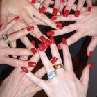 paint your nails with red varnish
