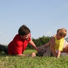 Portrait of a three generation family standing in a garden