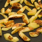 Closeup of red new potatoes in pile.