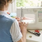 Seamstress posing by mannequins