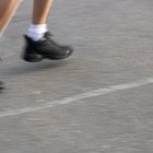 Woman walking along path