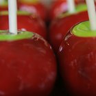 Fresh red apples in wooden box.