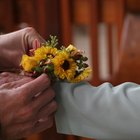 groom with buttonhole rose decoration