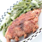 rack of lamb on grill with an asparagus