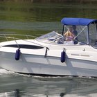 Como adicionar óleo aos cilindros do trim do MerCruiser