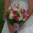 side view of a bride and groom holding each other at the entrance to the church