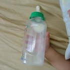 Newborn baby drinking milk