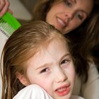 Youngsters getting head inspected for lice