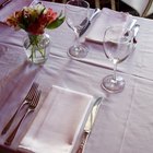 Bride And Groom Enjoying Meal At Wedding Reception