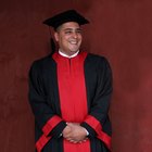 Men and woman in graduation cap and gown