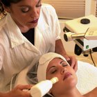 Woman receiving alternative therapy on face