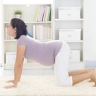 Pregnant Asian couple hugging