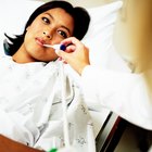 pregnant woman in  nightdress  with thermometer