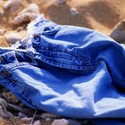 Close-up of jeans on a rack