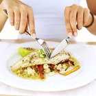 Baked halibut with vegetable garnish and couscous