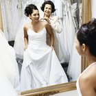 portrait of a bride a two bridesmaid outside a church