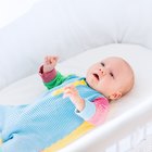 Tired baby in bouncy chair