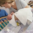 close-up portrait of a beautiful sleeping baby on white