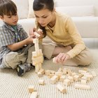 Hispanic mother and son smiling at each other