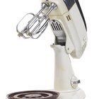¿Cuál es la diferencia entre la licuadora KitchenAid Professional y la KitchenAid Artisan?