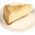 Fresh baked cheesecake on a wooden surface