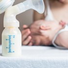 father bottle feeding baby (6-12 months)