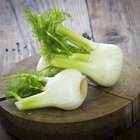 Onions and garlic bulbs on a plate