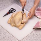 Roasted chicken on wooden plate