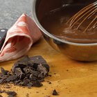 Glass bowl of melted milk chocolate