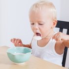 Baby eating rice cakes