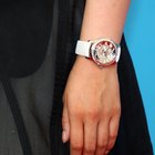 Man checking time on wrist watch, close-up