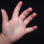 Grandmother's Hands Holding Newborn's Feet