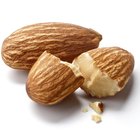 Active Senior woman with handful of walnuts