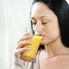 Woman Dropping Antacid into Water