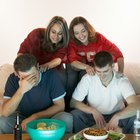 Daughter and wife giving man a gift