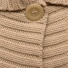 Button on knitted sweater