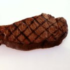 new york strip steak in iron skillet