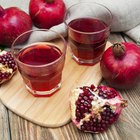 Image of glasses of orange juice and cranberry juice