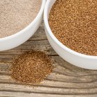 Flour in a bowl on a rustic wooden kitchen table