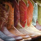 Rack of cowboy boots in shoe store, full frame
