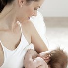 High angle view of woman breastfeeding baby